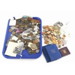 A large quantity of mainly British currency, to include old style one pound coins, fifty pences, dec