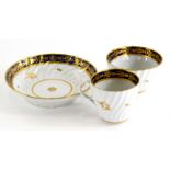 A late 18thC English porcelain trio, comprising tea bowl, saucer and tea cup, 6cm high, each in ribb