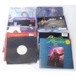 A quantity of heavy metal 12 inch and LPs, bands to include Aerosmith, Anthrax, Judas Priest, Whites