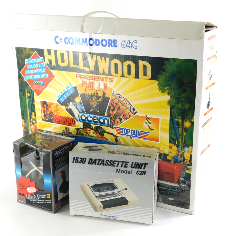 A vintage Commodore C64 boxed Hollywood set of boxed joystick, user manual, units, wires, etc., the
