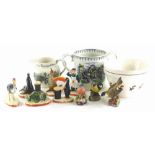 A collection of Carltonware Guinness figurines, a Taunton cider 1976 Wade commemorative two handled