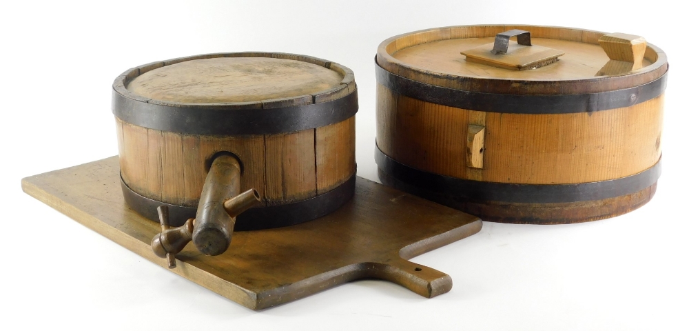 Various rural bygones, an early 20thC chopping board of rectangular form with moulded handle, 53cm w