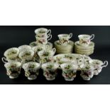 A Royal Albert Flowers of The Month December pattern part service, to include three tier cake stand,