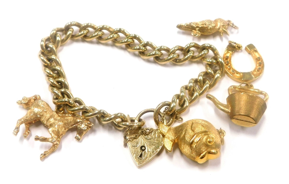 A 9ct gold curb link chain, mounted with a 9ct gold horse shaped charm, and four further 9ct gold ch