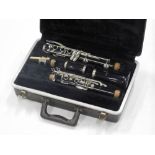 An Elkhart clarinet, in a fitted case.