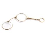 A pair of 9ct gold lorgnette, with two lenses and loop stamped 375, maker's stamp PE.