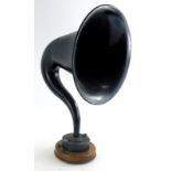 A 20thC bygone BBC stamped metal sound horn, on wooden mount, 59cm high.