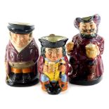 Three Toby jugs, a Royal Doulton Sir John Falstaff, The Huntsman and Jolly Toby