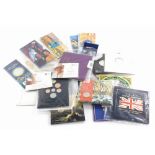 Two United Kingdom twenty pound fine silver commemorative coins and other commemorative coins.