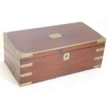 A 19thC mahogany and brass bound campaign writing box, the rectangular top engraved with cartouche E