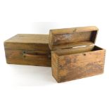 An early 20thC pine box, of rectangular form with hinged lid and plain interior, with leather strap