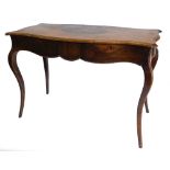 A 19thC walnut library table in French style, the shaped rectangular top with a central marquetry ca