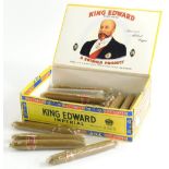 A part box of King Edward Imperial cigars, each in wrappers, 13cm wide, the box open. (a quantity)