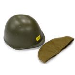 A green US Army Second World War type metal helmet, and a beret with Russian enamel badge.