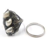 Two dress rings, to include a cultured pearl and leaf design dress ring, white metal, unmarked, ring