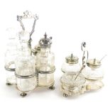 A harlequin cut glass and silver plated cruet set, of miniature form, with shield shaped pierced han