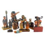 A good and varied selection of continental carved articulated figures, to include cork screws, shoe