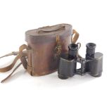 A pair of Watson Baker and Co binoculars, dated 1941, the leather case stamped Wray, London, Air min