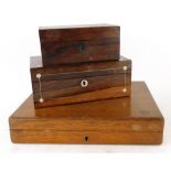 A collection of boxes, to include two rosewood and mother of pearl inlaid jewellery boxes and an oak