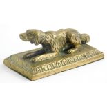 A Victorian cast brass paperweight, modelled in the form of recumbent hound, 11cm wide.