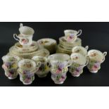 A Royal Albert Flowers of The Month April part tea service, to include cake stand, jug, cup, saucers