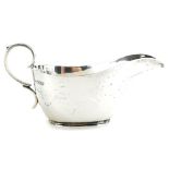 A George V silver sauce boat, of plain form, Sheffield 1917, 5oz.