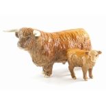 A Beswick ceramic highland cow and a Beswick calf. (2)
