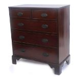 A 19thC mahogany and boxwood strung chest of drawers, the top with a reeded edge above two short and