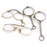 A small collection of lorgnette, to include three examples, each with gold coloured metal frames and