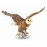 A Beswick ceramic bald eagle, 33cm wide.