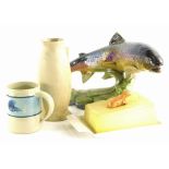 A collection of ceramics, to include a glazed pottery salmon, a Victorian Staffordshire lion (AF), e