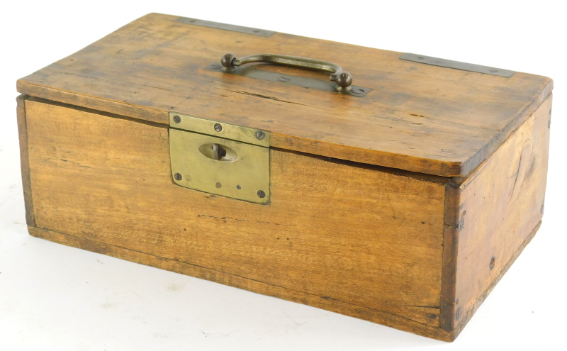 A 20thC rectangular treen box, with swing brass handle and mounts, 25cm high, 34cm wide, 18cm deep.