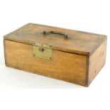 A 20thC rectangular treen box, with swing brass handle and mounts, 25cm high, 34cm wide, 18cm deep.