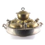 A 20thC silver plated hot plate stand, of circular form, centred by a removable bowl, with four entr