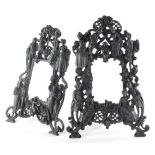 Two similar bronzed cast iron photograph frames, each decorated with figures, 39cm high.
