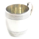 An Edward VII silver Christening mug, of barrel form with repeat line decoration, London 1906, 6.5cm