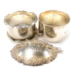 A collection of small silver, Port decanter label and two napkin rings, 2¼oz overall. (3)