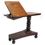 An early Victorian mahogany adjustable reading table, the rectangular top with a part hinged and rat