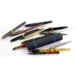 A quantity of fountain pens, other pens, etc.