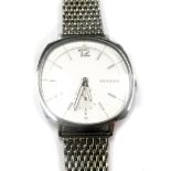 A Skagen gentlemans stainless steel cased wristwatch, with circular dial on pleated bracelet, boxed.