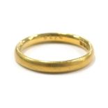 A 22ct gold wedding band, 3.7g.