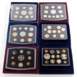 Royal Mint mint coin sets for 2000, 2001, 2002, 2003, 2004, 2005.