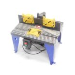 An electric router table, 46cm wide.