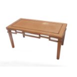 A Chinese hardwood rectangular coffee table, with a pierced frieze and turned tapering legs, 91cm wi