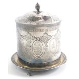 A late 19th/ early 20thC silver plated biscuit barrel, with an acorn finial and an all over design o