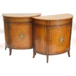 WITHDRAWN PRE SALE BY VENDOR. A pair of satinwood demi lune side cabinets, in Sheraton revival