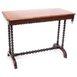 A Victorian mahogany library table, the rectangular top with a moulded edge and a crenellated frieze