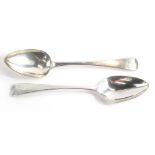 A pair of George III silver Old English pattern serving spoons, with engraved initials, London 1801,