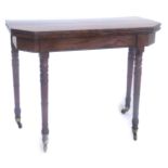 A 19thC mahogany card table, the rectangular top with canted front corners above a plain frieze with