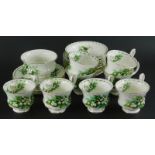 A Royal Albert Flowers of the Month May pattern part tea service, to include eight cups, cereal bowl